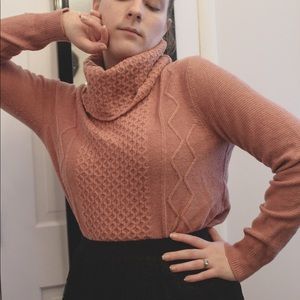 Pink turtleneck sweater